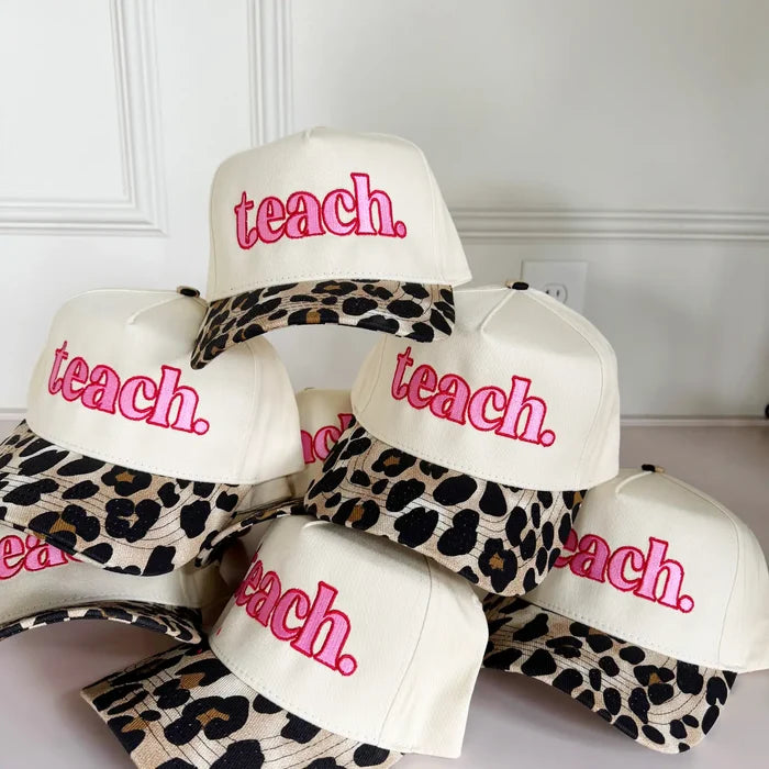 Women's leopard print and pink "Teach" trucker hat.