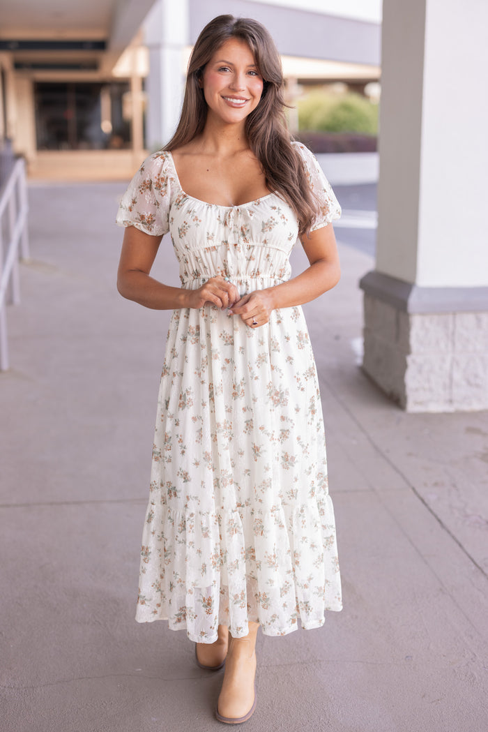 Women's cream midi dress with mustard and olive floral print sheer overlay by Blu Pepper, perfect for thanksgiving gatherings