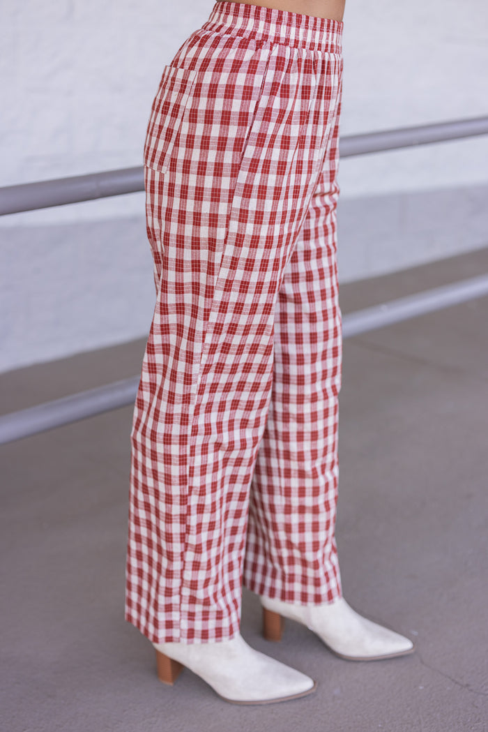 Women's rust and taupe plaid wide leg pants by Wishlist showing up close side view