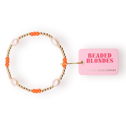Beaded Blondes orange and pearl beaded bracelets