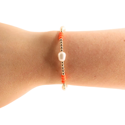 Beaded Blondes orange and Poppi pearl beaded bracelets