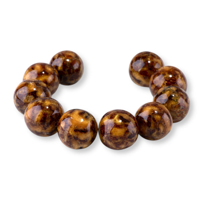 This is a Dakota Stones 20mm Beehive Gemstone strand with round beads in 8 inch strand.