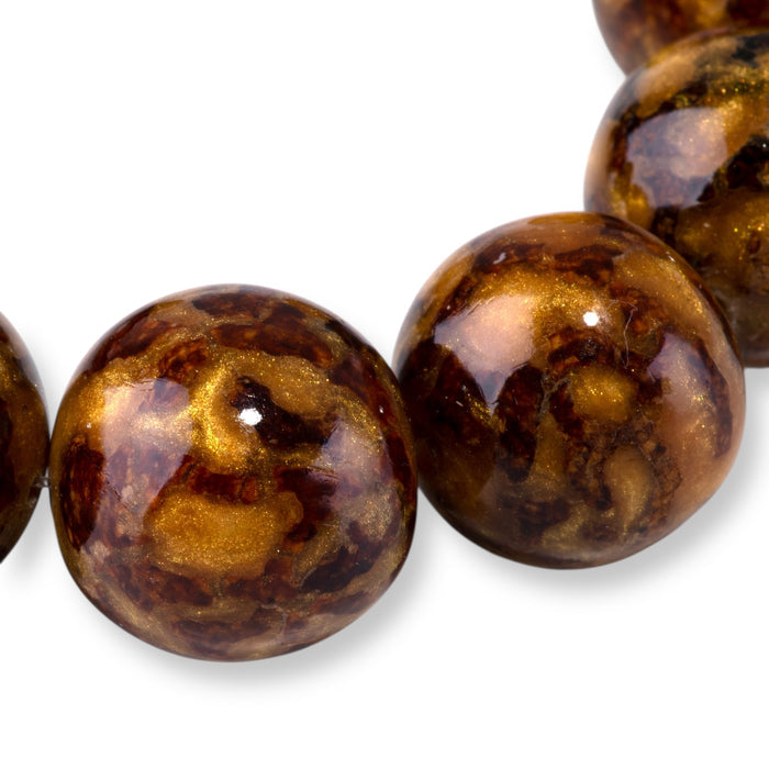 This is a Dakota Stones 20mm Beehive Gemstone strand with round beads in 8 inch strand.