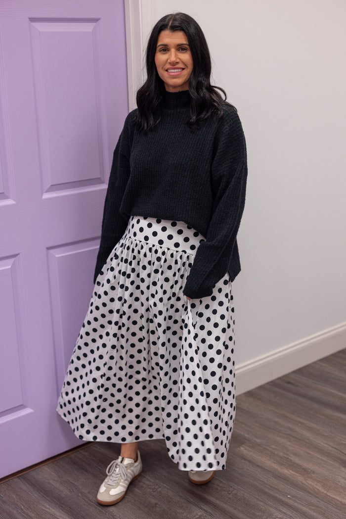 Women's black polka dot maxi skirt by Day + Moon, perfect for church