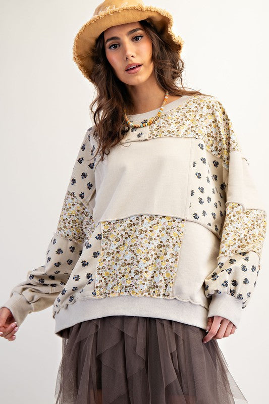 Women's beige french terry knit pullover top with patchwork floral print by easel