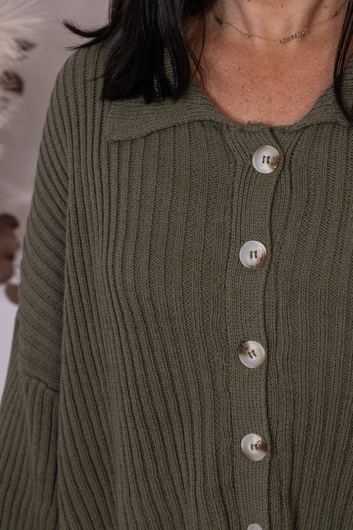 Women's olive button front sweater knit cardigan with a collar by She & Sky showing button front closures with collar
