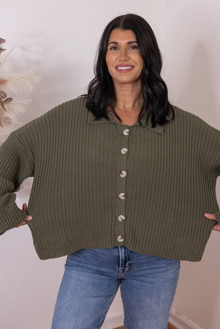Women's olive button front sweater knit cardigan with a collar by She & Sky showing true to size fit