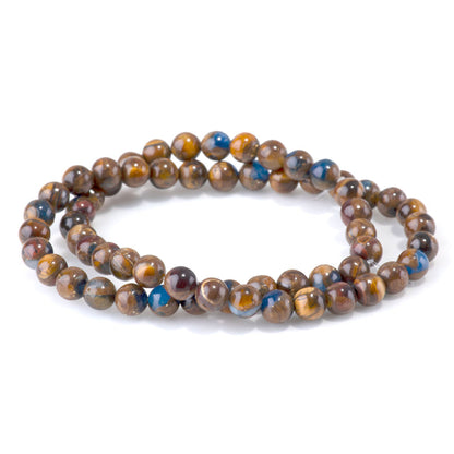 This is a Dakota Stones 6mm Bronzite Tiger Eye Lapis Compressed Gemstone strand with round beads in 15-16 inch strand.