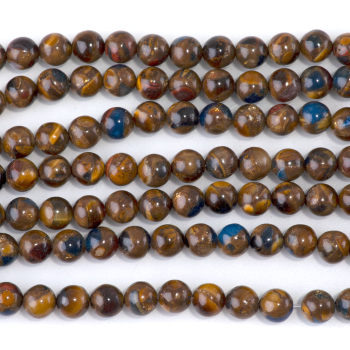 This is a Dakota Stones 6mm Bronzite Tiger Eye Lapis Compressed Gemstone strand with round beads in 15-16 inch strand.