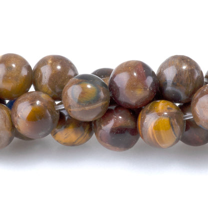 This is a Dakota Stones 6mm Bronzite Tiger Eye Lapis Compressed Gemstone strand with round beads in 15-16 inch strand.