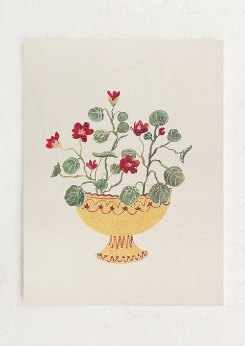 An art print of a painting of crimson nasturtiums in a yellow compote bowl.