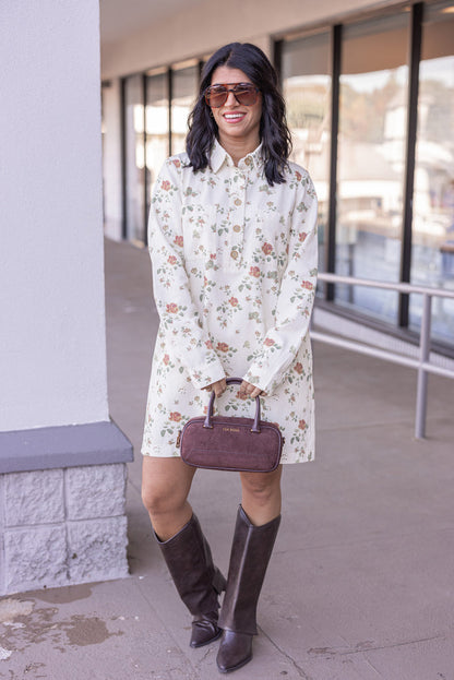 Women's cream denim floral print dress with button front bodice by In February showing button details showing full front view