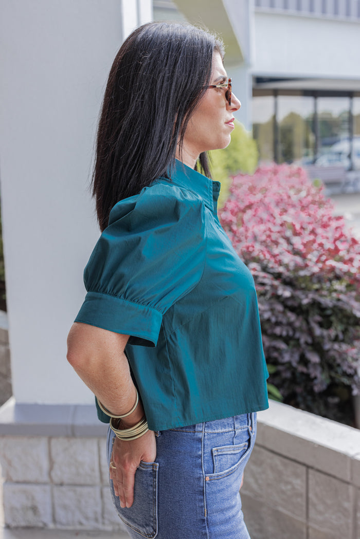 Women's hunter green puff sleeve button front cropped top by Entro showing up close side view