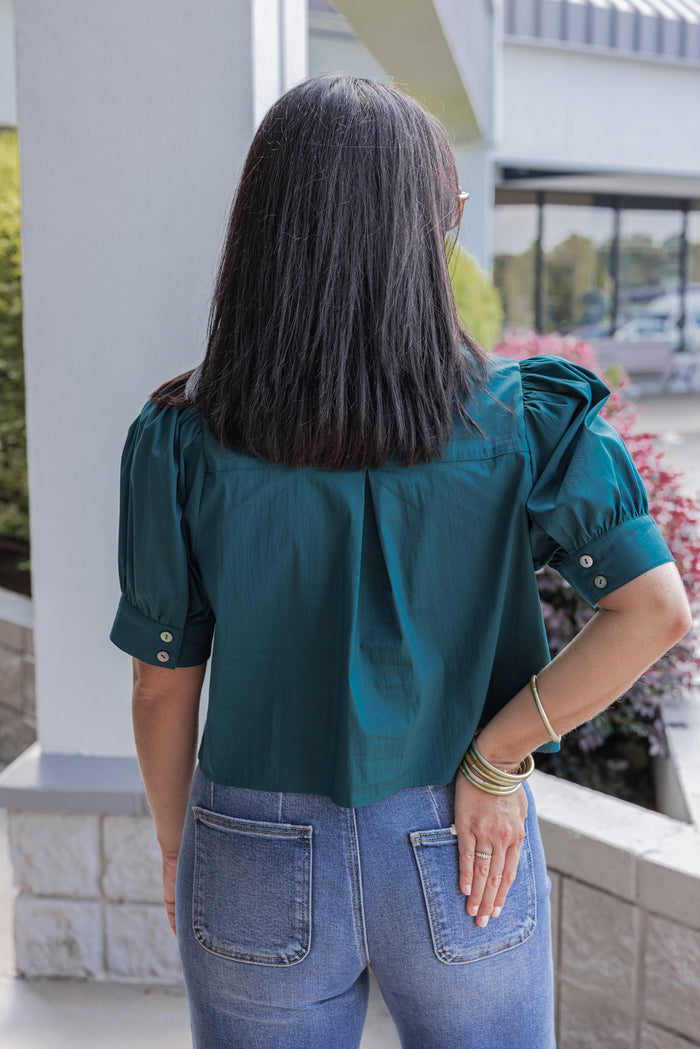Women's hunter green puff sleeve button front cropped top by Entro showing up close back view