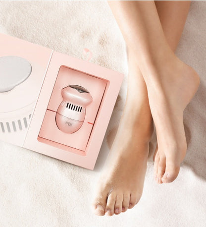 Foot grinder for hard skin shown with brush, sponge ring, and replacement heads in flat lay