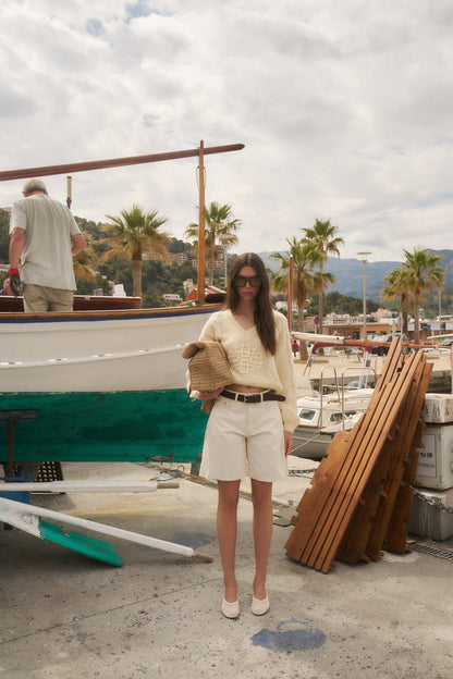 EMBLEM KNITTED V NECK JUMPER - BUTTERMILK