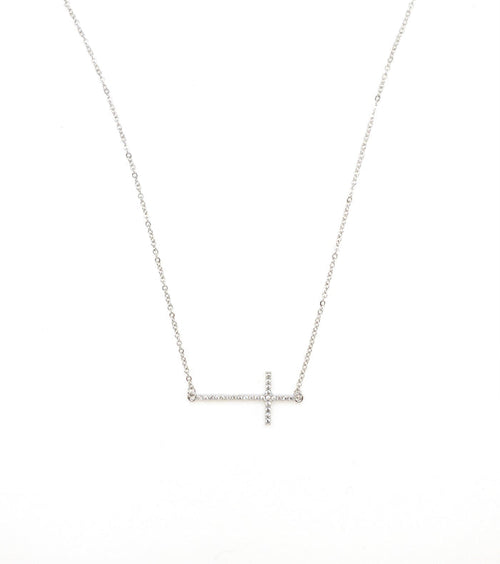 Silver sideways cross necklace.