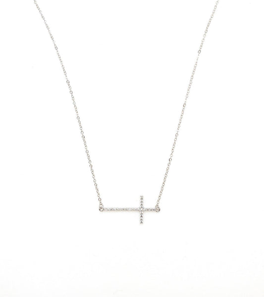 Silver sideways cross necklace.