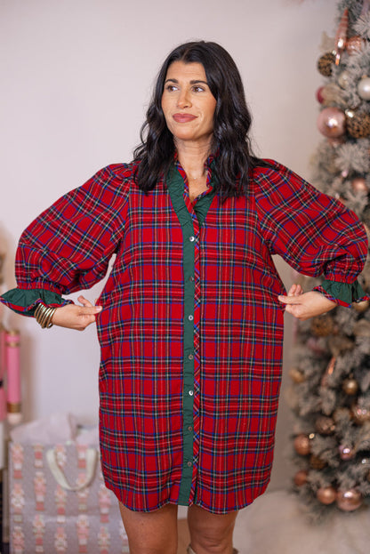 Women's red and green plaid flannel button front dress with ruffle details by Entro showing true to size fit
