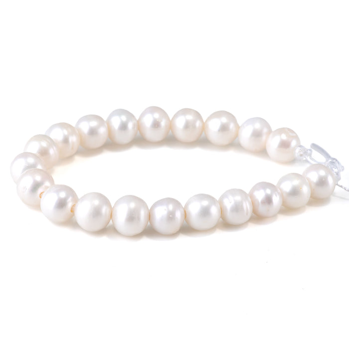 This is a Dakota Stones 10-11mm Freshwater Pearl White Potato Large Gemstone strand of round beads in 8 inch strand.