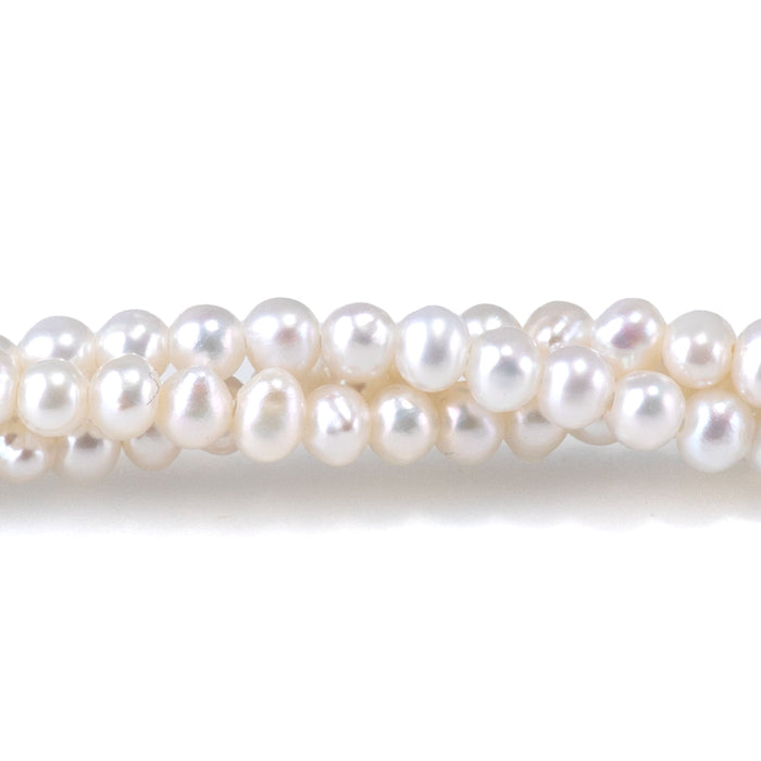 This is a Dakota Stones 3-4mm Freshwater Pearl White Potato Gemstone strand of round beads in 15-16 inch strand.