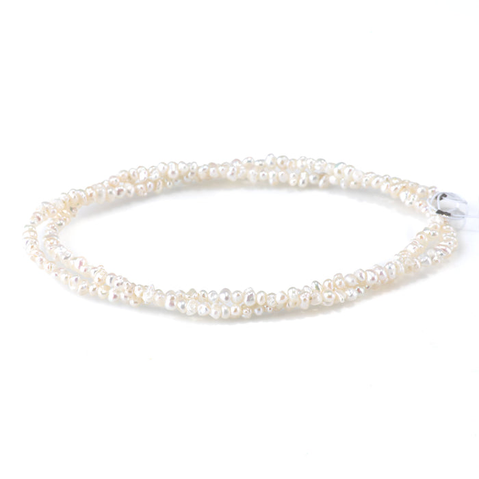 This is a Dakota Stones 3mm Freshwater Pearl White Cispy Potato Gemstone strand of round beads in 15-16 inch strand.