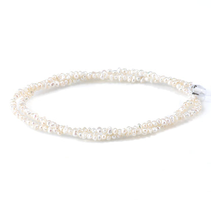 This is a Dakota Stones 3mm Freshwater Pearl White Cispy Potato Gemstone strand of round beads in 15-16 inch strand.