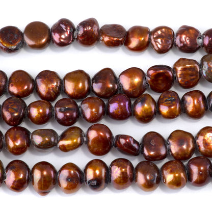 This is a Dakota Stones 8-11mm Freshwater Pearl Red Brown Gold Gemstone strand with irregular beads in 8 inch strand.