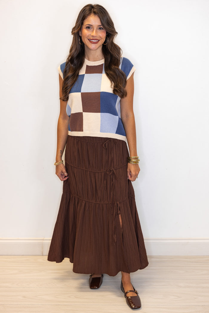 Women's pleated chocolate brown tiered midi skirt with bow ties down one side by In February showing full front view