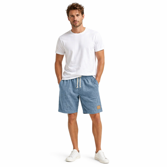 Front view of relaxed men's holiday shorts in khaki with a straight-leg fit and soft textured summer fabric.