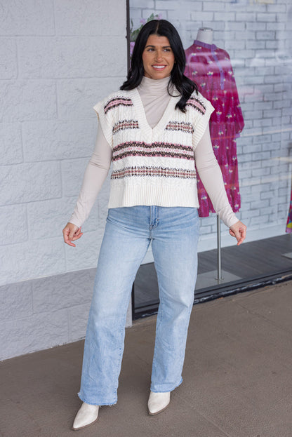 Women's ivory cable knit sweater vest style top with brown and pink stripes by idem ditto showing full front view