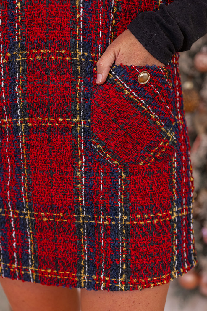 Women's sleeveless tweed dress in red plaid by Day + Moon showing front pocket detail