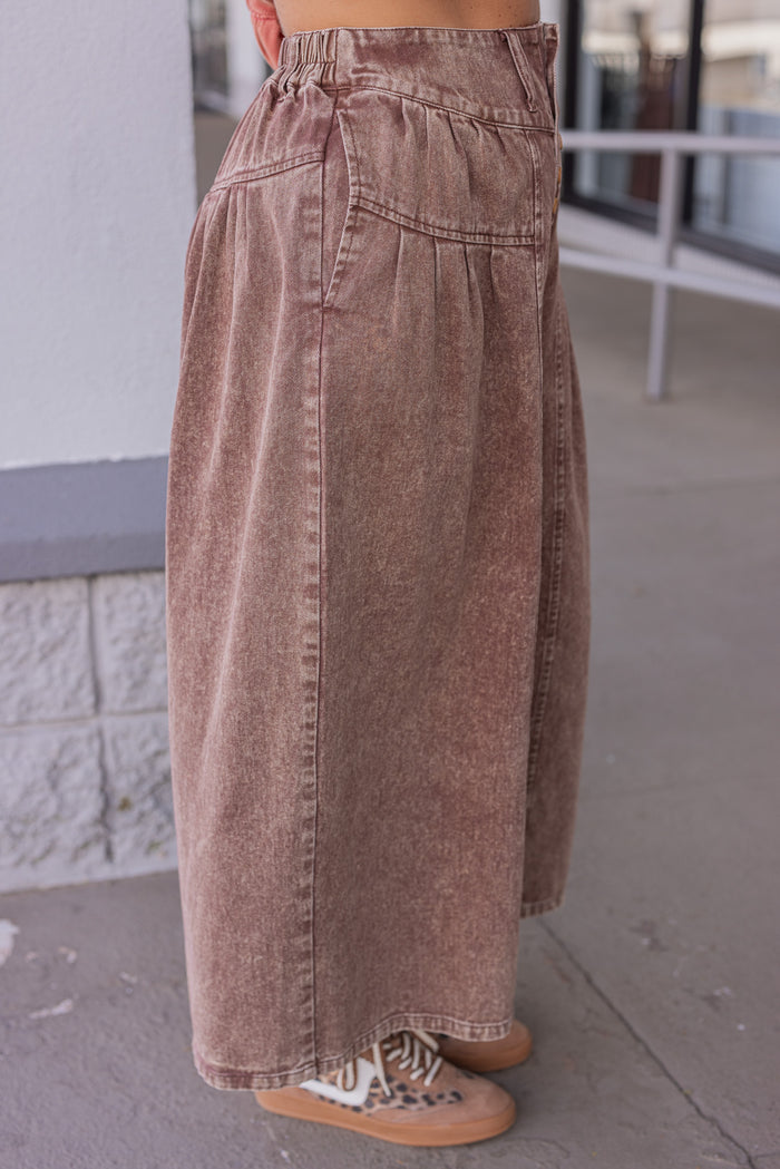 Women's brown washed twill denim exaggerated wide leg pleated pants by Fantastic Fawn showing up close side view