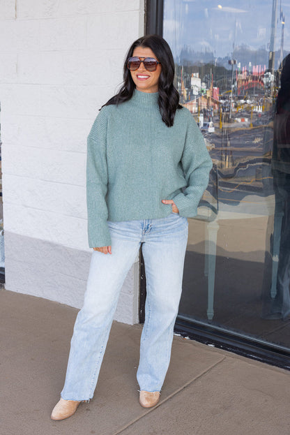 Women's pistachio green ribbed knit sweater by Wishlist, perfect for cooler weather