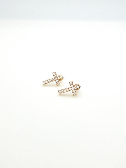 Gold with small pearl detail cross stud earrings