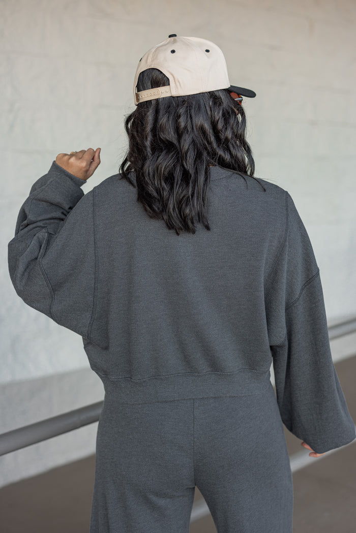washed black knit cropped pullover top back view