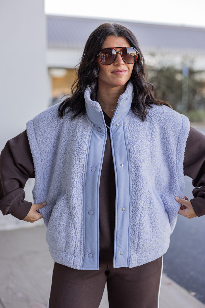 Women's light blue sherpa vest by Rae Mode showing relaxed fit