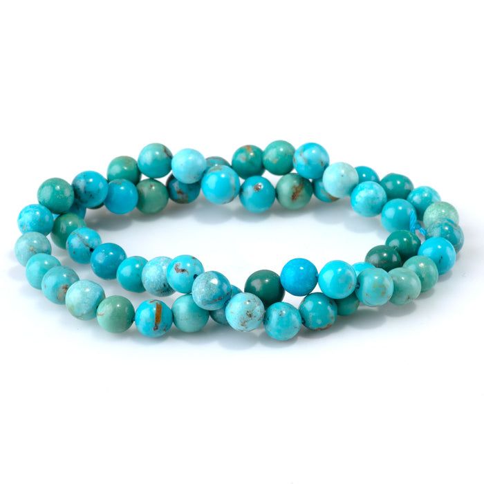 This is a Dakota Stones 7mm Sky Blue Hubei Turquoise Gemstone strand with round beads in 15-16 inch strand.
