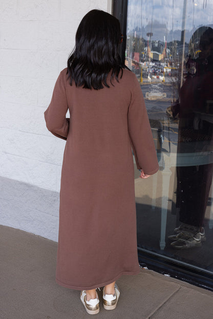 Women's coffee brown knit long sleeve midi sweater dress by Entro showing full back view