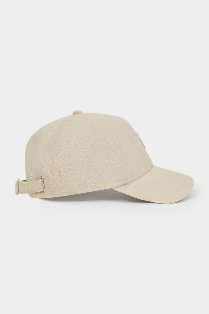 TEXTURED METAL BADGE CAP - BEIGE