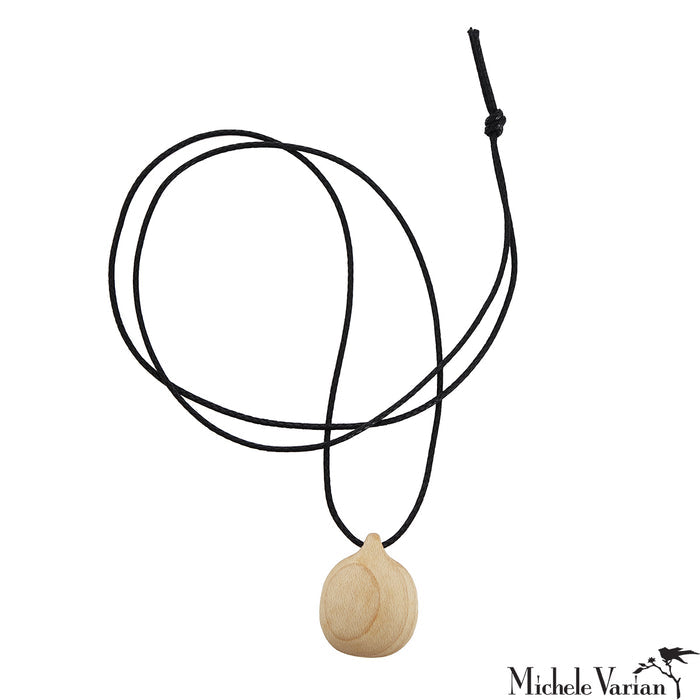 Necklace with a wooden pendant on a white background